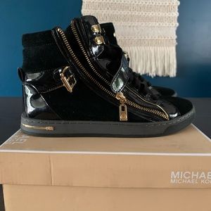 Michael Kors urban studded high top sneakers.